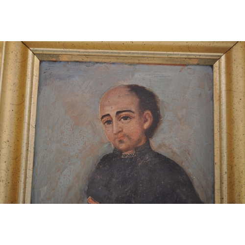 539 - A 19th century Spanish school, oil on board, portrait painting depicting seated monk in robes with f... 