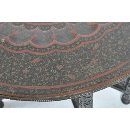 545 - A 19th Century Anglo Colonial Indian Persian Islamic brass benares table. Comprising a heavy brass t... 