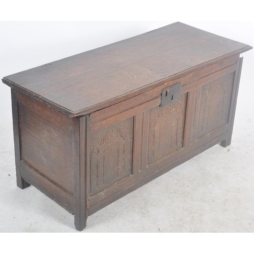 55 - A 19th Century carved oak coffer blanket box storage chest trunk. Carved fielded panels to the front... 