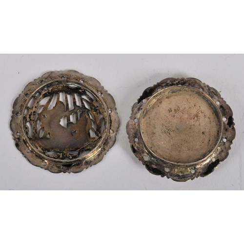 550 - A 17th century German silver table pomander. Of circular form, with pierced top decoration of two fi... 