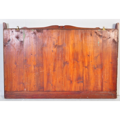 552 - An early 20th century mahogany gunsmiths shooting gun stock cabinet. Twin glazed door with notation ... 