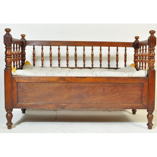 554 - 19th century Victorian mahogany cot / child's crib bench. Turned column gallery throughout with cush... 