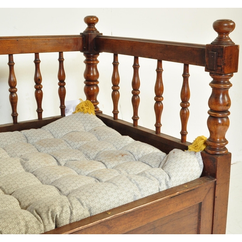 554 - 19th century Victorian mahogany cot / child's crib bench. Turned column gallery throughout with cush... 