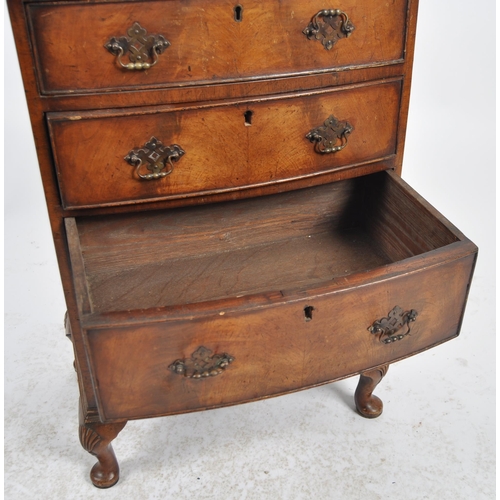 556 - An 18th Century George III and later bow fronted chest of drawers of small proportions. The bachelor... 