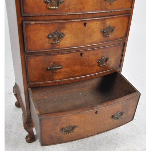 556 - An 18th Century George III and later bow fronted chest of drawers of small proportions. The bachelor... 