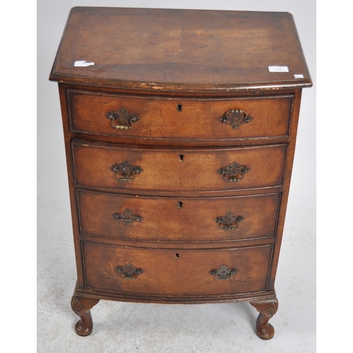 556 - An 18th Century George III and later bow fronted chest of drawers of small proportions. The bachelor... 