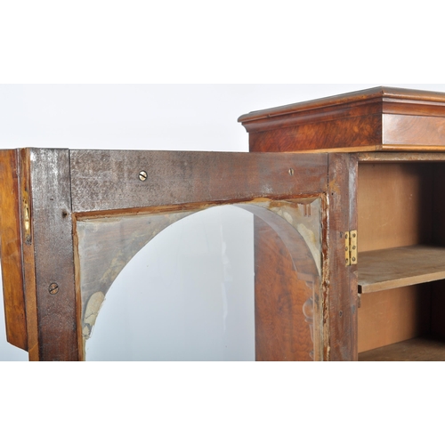 56 - A 19th Century Victorian walnut library bookcase cabinet vitrine. Flared pediment top with twin glaz... 