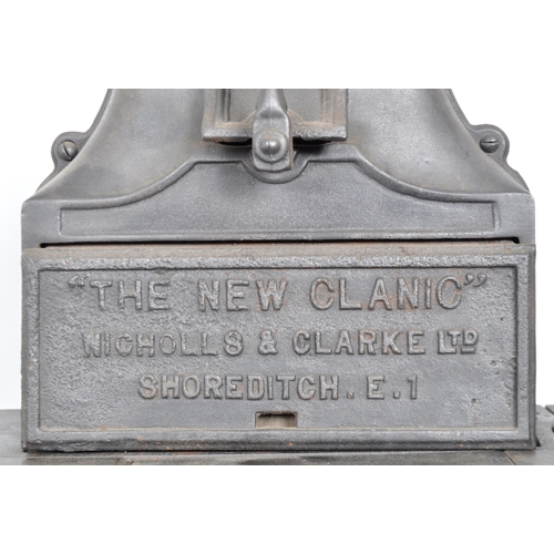 563 - A 19th Century Victorian cast iron oven stove - The New Canic. Nameplated chimney to top with lockin... 