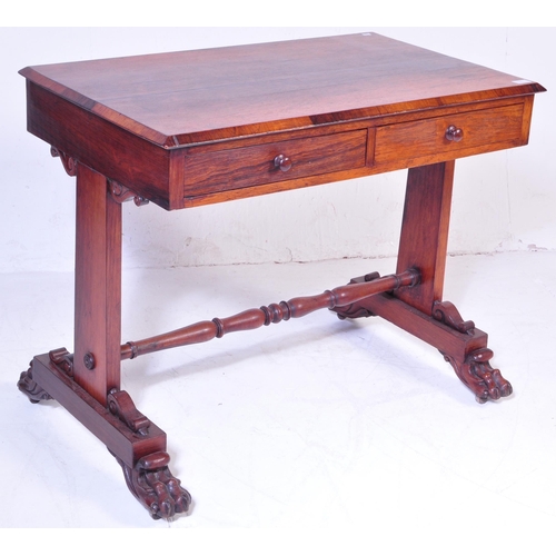 566 - A 19th Century William IV Rosewood writing table desk. Chamfered edge writing table top with twin dr... 