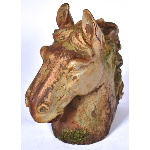 567 - A large 19th Century Victorian heavy cast iron garden ornament in the form of a horses head having d... 