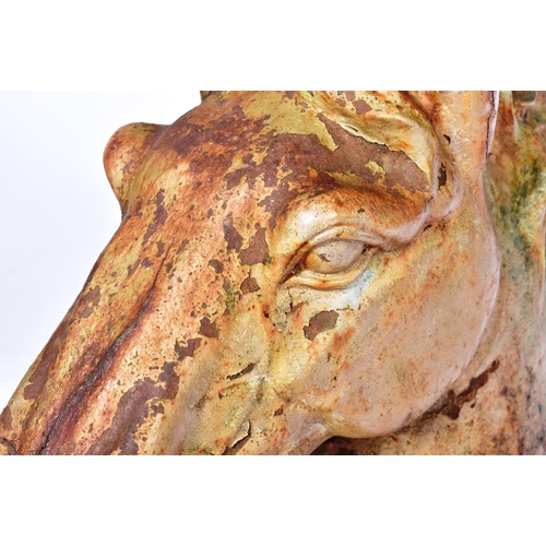 567 - A large 19th Century Victorian heavy cast iron garden ornament in the form of a horses head having d... 