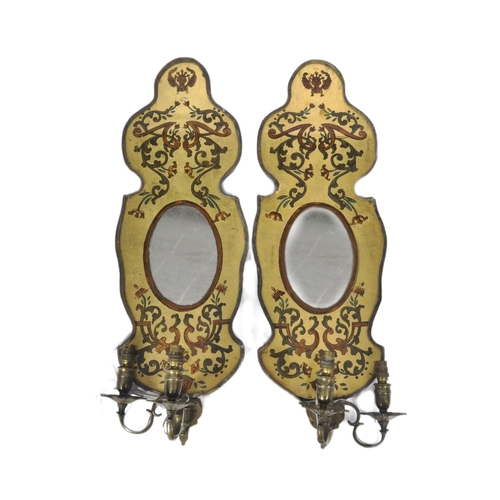 581 - A pair of 19th Century Victorian eglomise wall Girondales with brass candle sconces to the front. Sc... 