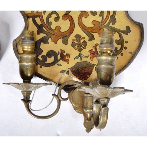 581 - A pair of 19th Century Victorian eglomise wall Girondales with brass candle sconces to the front. Sc... 