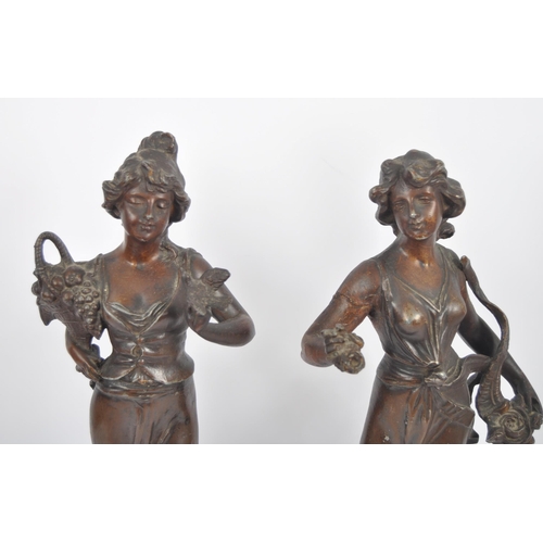 582 - A pair of 19th Century French Art Nouveau spelter figures depicting classical ladies in full garment... 