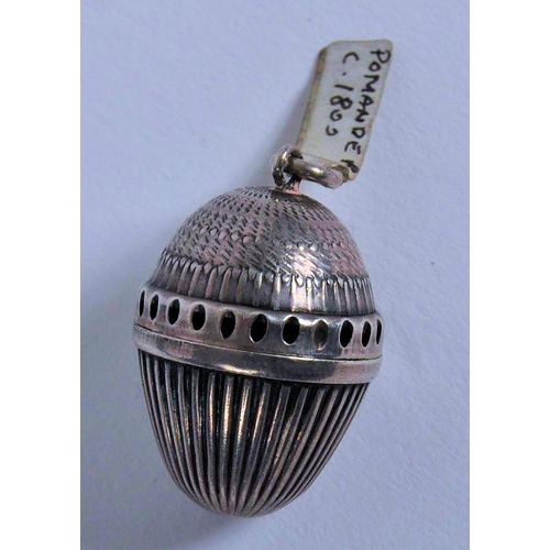 584 - A lathe turned acorn shaped pomander. Probably German, a 19th century engine turned silver acorn sha... 