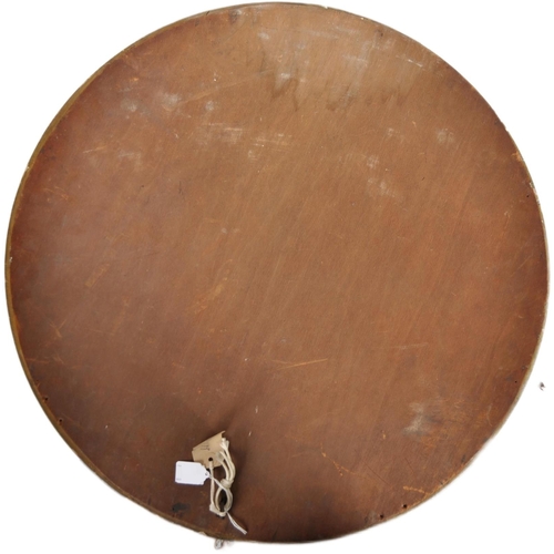 590 - A Regency 19th century gilt wood and gesso worked convex fish eye / wall mirror. The convex mirror g... 