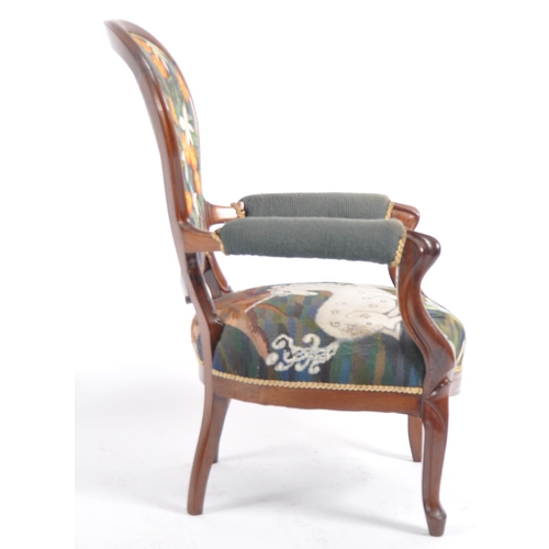 593 - A 19th Century French Empire mahogany fauteuil armchair. Broad tall backrest with overstuffed cushio... 