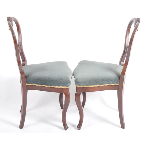 594 - A set of six 19th Century mahogany swept kidney balloon back dining chairs with scroll and shell pat... 