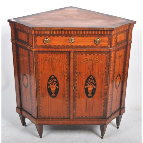 596 - A pair of 19th Century French inlaid satinwood encoignure corner cabinets having fitted central draw... 