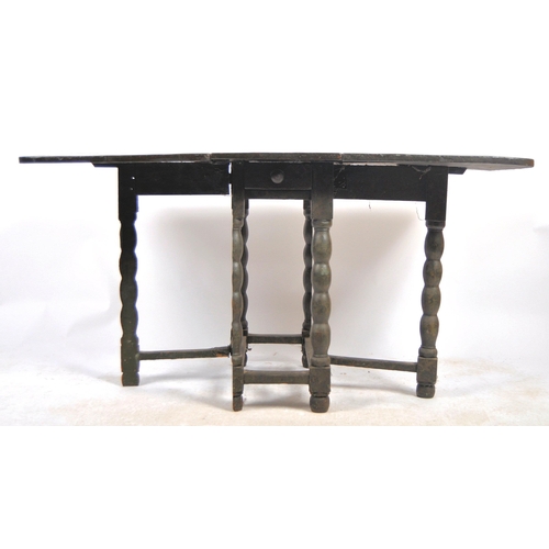 597 - A late 17th Century Hindeloper painted gateleg dining table / side occasional table. The centre port... 