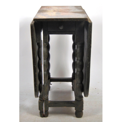 597 - A late 17th Century Hindeloper painted gateleg dining table / side occasional table. The centre port... 