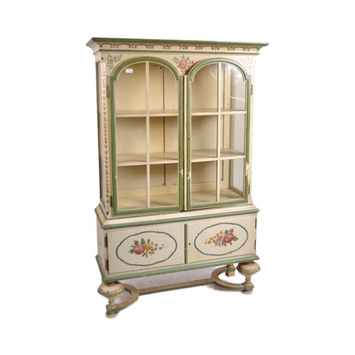 598 - A 19th Century Dutch painted display cabinet bookcase vitrine with moulded cornice, arched glazed do... 