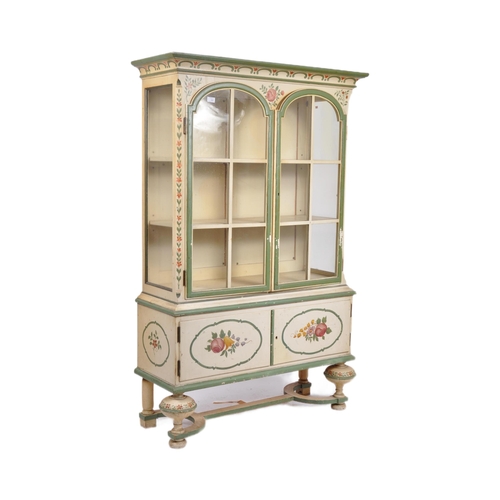 598 - A 19th Century Dutch painted display cabinet bookcase vitrine with moulded cornice, arched glazed do... 