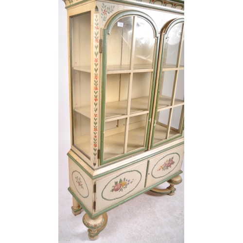 598 - A 19th Century Dutch painted display cabinet bookcase vitrine with moulded cornice, arched glazed do... 