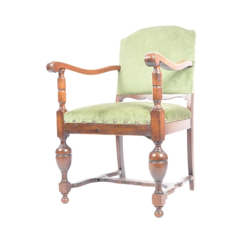 599 - A 19th Century Victorian mahogany armchair / arm chair. Green upholstery to the backrest and seat wi... 