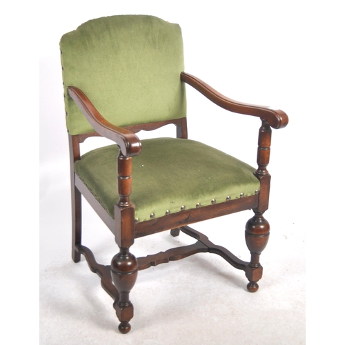 599 - A 19th Century Victorian mahogany armchair / arm chair. Green upholstery to the backrest and seat wi... 