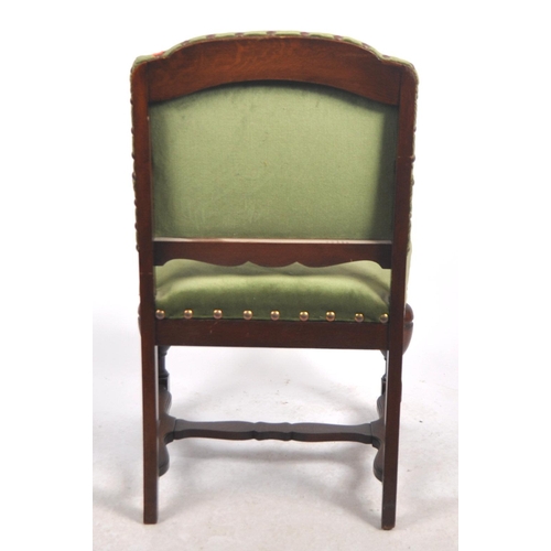 599 - A 19th Century Victorian mahogany armchair / arm chair. Green upholstery to the backrest and seat wi... 