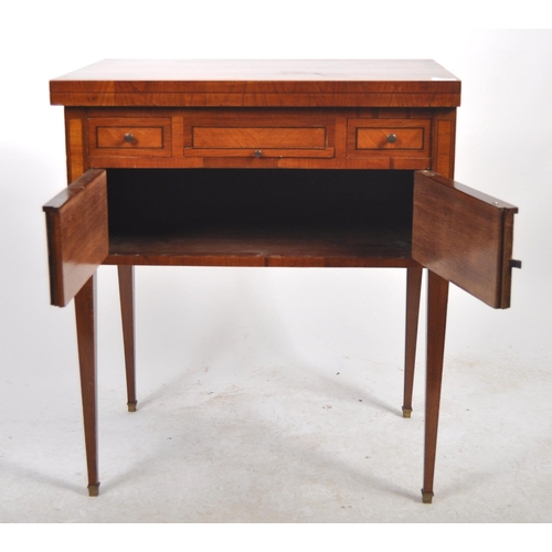 601 - A 19th Century satinwood writing table desk having a fold over top with series of drawers above a si... 