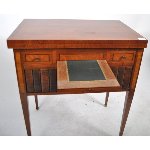 601 - A 19th Century satinwood writing table desk having a fold over top with series of drawers above a si... 