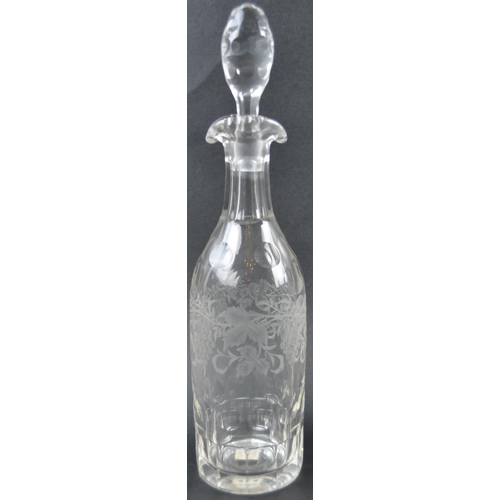 614 - A 19th Century etched glass liquor drinks set comprising of two tall decanters with faceted stoppers... 