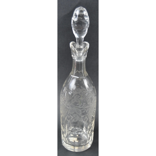 614 - A 19th Century etched glass liquor drinks set comprising of two tall decanters with faceted stoppers... 