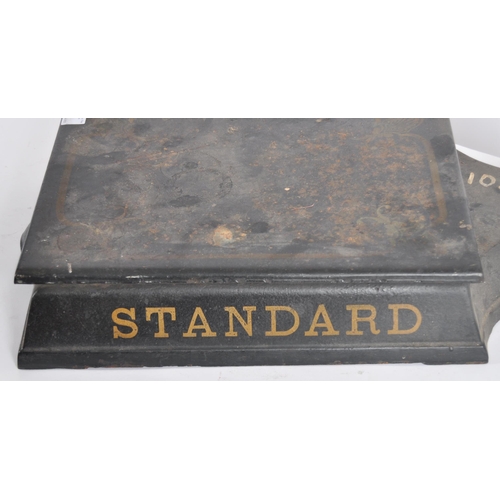 619 - A 19th Century Victorian set of cast iron Standard scales. Cast iron block base with gilt lettering ... 