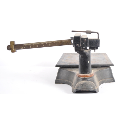 619 - A 19th Century Victorian set of cast iron Standard scales. Cast iron block base with gilt lettering ... 