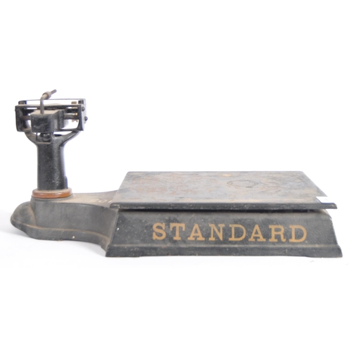 619 - A 19th Century Victorian set of cast iron Standard scales. Cast iron block base with gilt lettering ... 