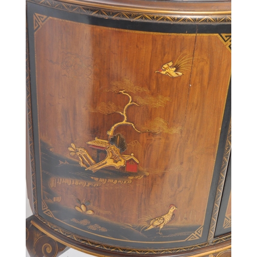 620 - An early 20th Century Art Deco walnut Demilune Chinoiserie bow fronted cabinet cupboard. The cabinet... 