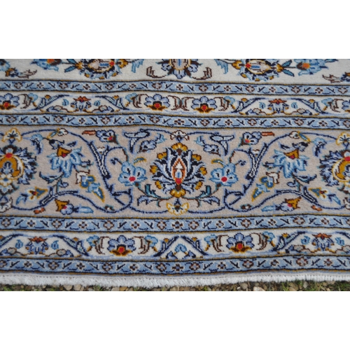 622 - A very large 20th Century Persian Islamic wool floor carpet rug. Cream ground with blue repeating fl... 