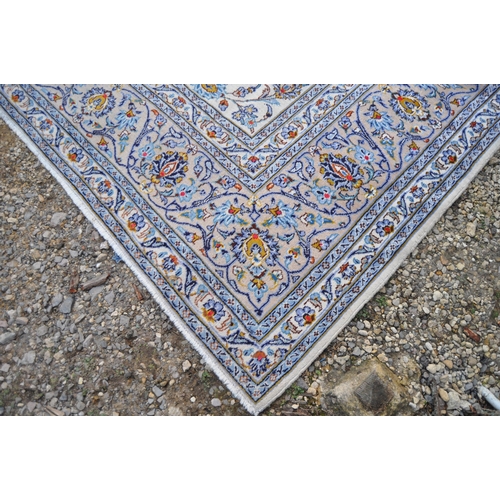 622 - A very large 20th Century Persian Islamic wool floor carpet rug. Cream ground with blue repeating fl... 