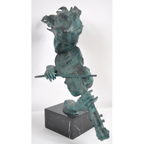 627 - A 20th Century modernist bronze sculpture of abstract form. The statue depicting a female violinist ... 