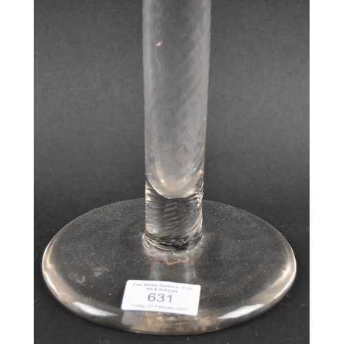 631 - A very large 18th Century oversized ceremonial glass goblet. Long wrythen moulded bowl tapers leadin... 