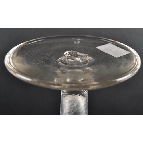 631 - A very large 18th Century oversized ceremonial glass goblet. Long wrythen moulded bowl tapers leadin... 