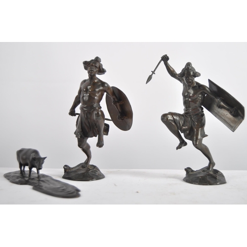 632 - A group of three 20th Century bronze figurines, two depicting warriors / hunters and the other depic... 