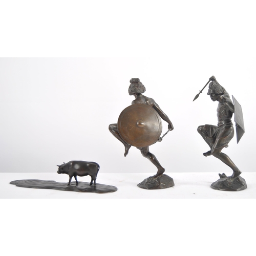 632 - A group of three 20th Century bronze figurines, two depicting warriors / hunters and the other depic... 