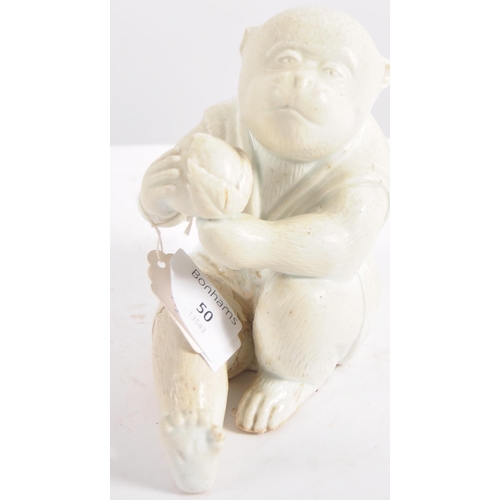 637 - A 19th Century Hirado (Japanese) porcelain monkey, late 19th Century, white glazed, modelled seated ... 