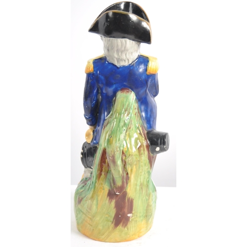 638 - A 19th Century Victorian Staffordshire figure / figural jug in the form of Admiral Horatio Nelson. H... 