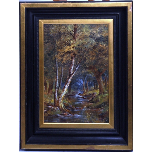 647 - An early 20th Century oil on tile landscape painting. Depicts a woodland scene with trees forming a ... 