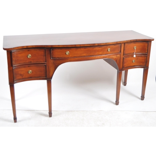 652 - A large 19th Century George III eight leg sideboard serving table. Serpentine fronted with single dr... 